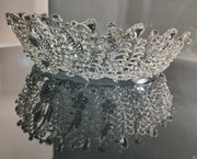 A vibrant fuchsia, sleeveless party dress with a playful skirt, ideal for a night out with friends.